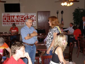 Pachyderm President Linda Van De Riet talking with Jim Terry.