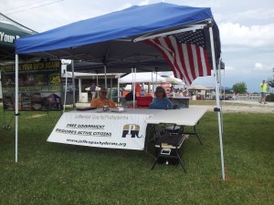 Pachyderm members Linda Schroder and Steve Farmer working our both at the Jefferson County Fair.